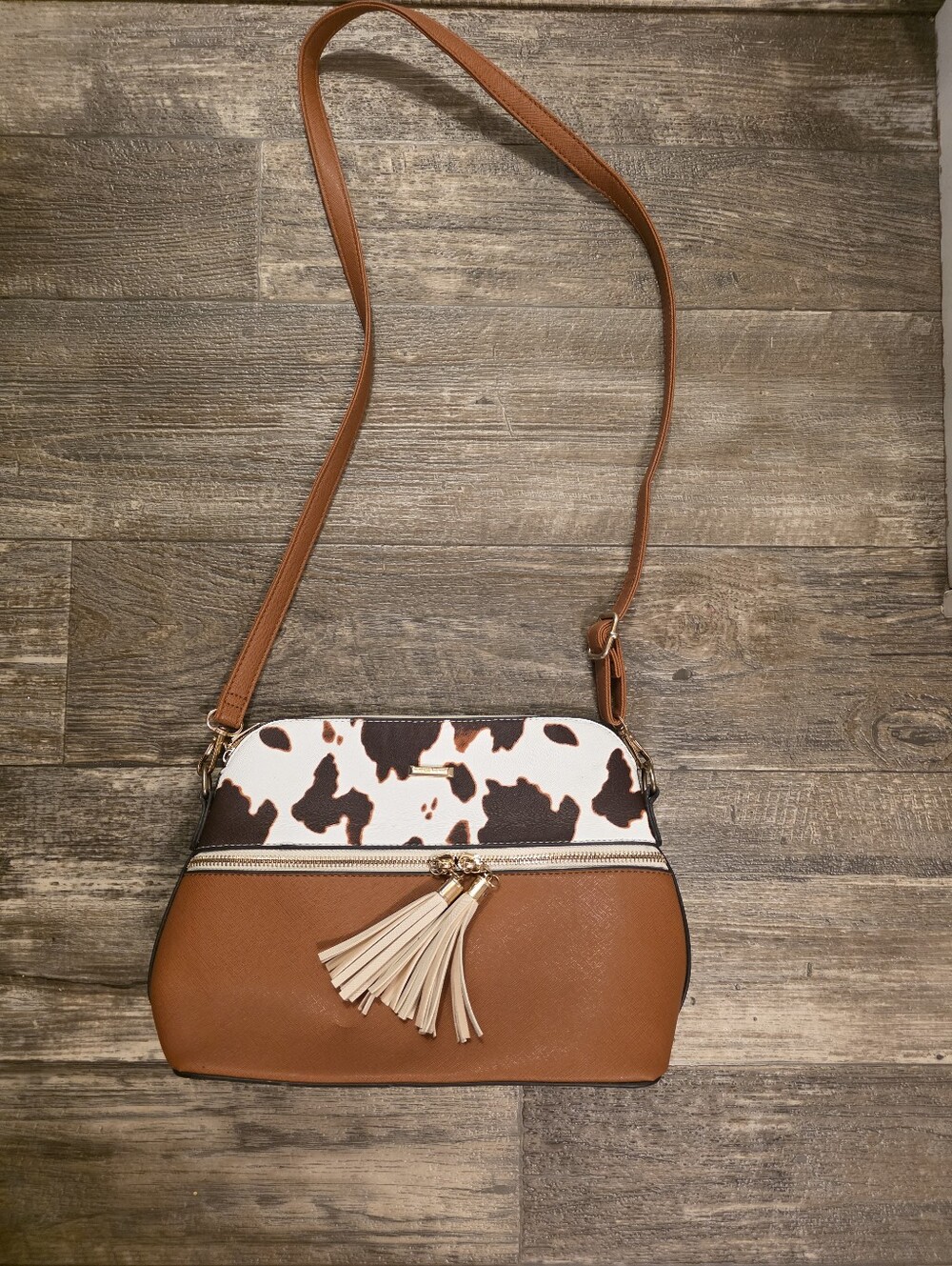 Tan and Cream Cowhide-Accent Crossbody Bag with Tassel
